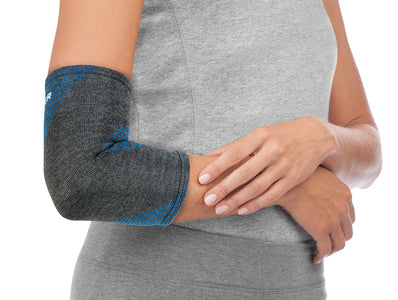 Load image into Gallery viewer, Mueller FIR (Far Infrared) 4-Way Elbow Support
