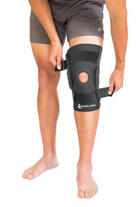 Load image into Gallery viewer, Mueller Hinged Wraparound Knee Brace
